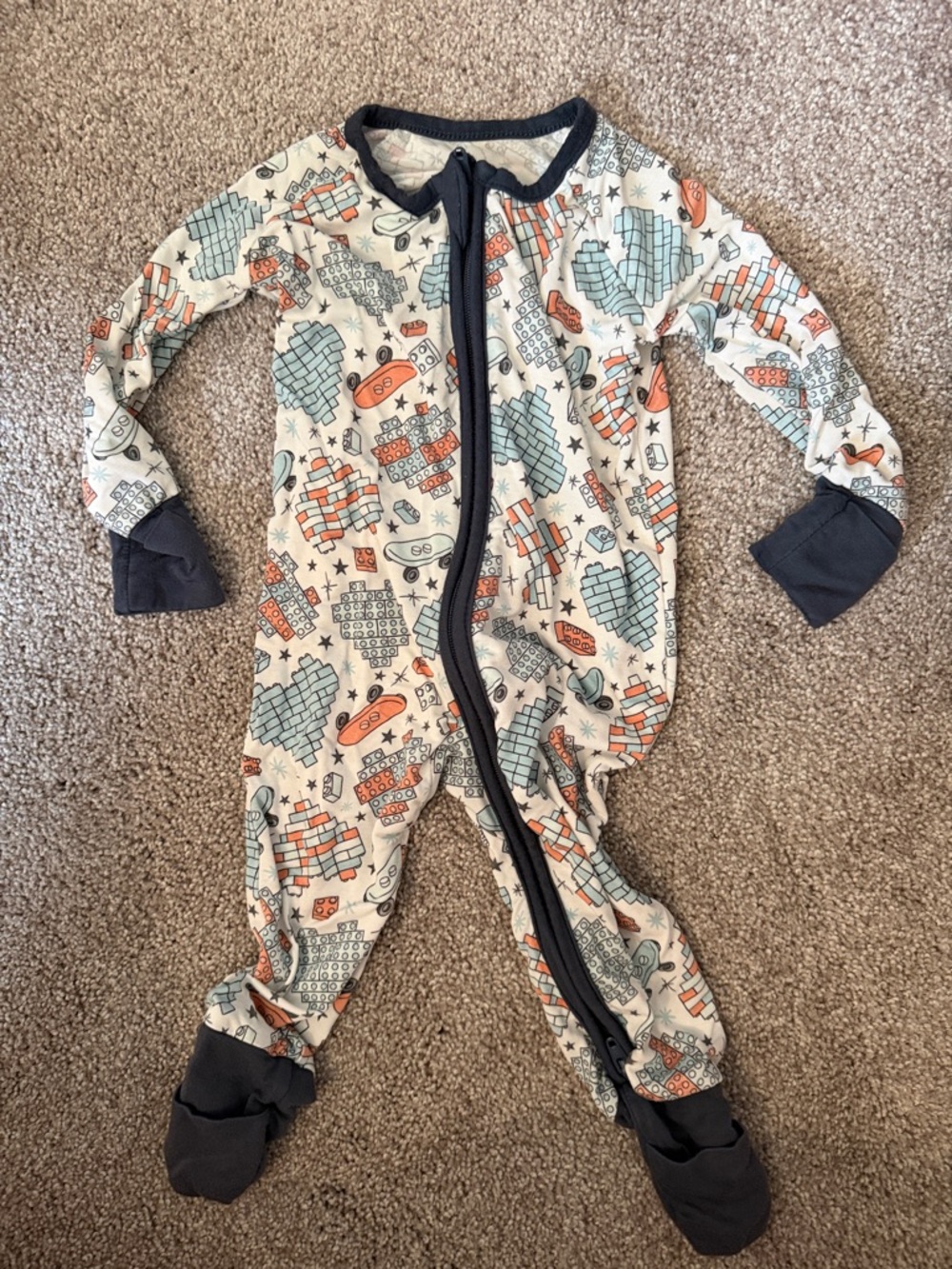 William and Ryan  Kids Cream Footed One-Piece Pajamas with Blue and Orange Print